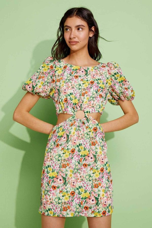 Tendencias que se siguen repitiendo a través del tiempo 4 vestido estampado cut out
